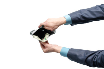 Businessman hand is holding a wallet with one dollar isolated on the white background. Lack of money. Pay the bill.