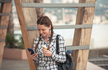 Fototapeta premium girl with a smartphone