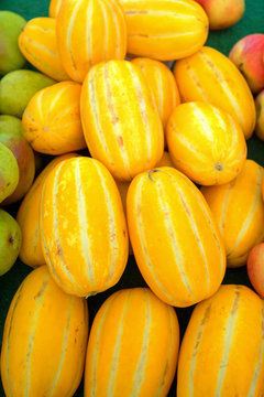 Raw korean melons at farmers market in California United States