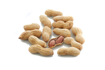 Peanuts.  unpeeled nuts isolated on white background. Peanut macro. Selective Focus