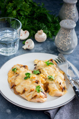 Chicken fillet breast with cheese and mushrooms, selective focus
