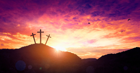 Fototapeta na wymiar Christmas concept: Crucifixion Of Jesus Christ Cross At Sunset