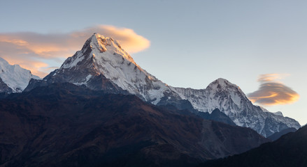 Annapurna South and clouds during sunrise as seen from Poonhill, Himalayas