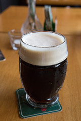 Dark beer with foam