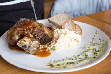 Pork knuckle with vegetables