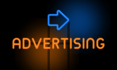 Advertising - orange glowing text with an arrow on dark background
