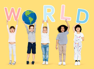 Obraz premium Happy kids supporting a global environment campaign