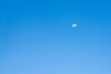 half moon in the sky