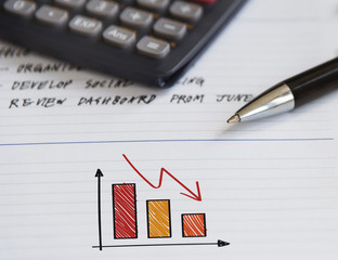 A business graph on a note