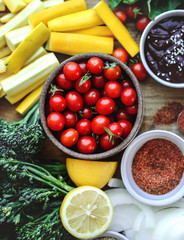 Fresh organic vegetables and ingredients prepared on a cutting board