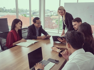 business people in meeting room,Businessman explaining new business ideas