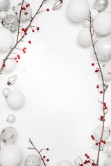 Christmas white wood background with bauble and red berries