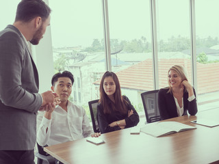 business people in meeting room,Businessman explaining new business ideas