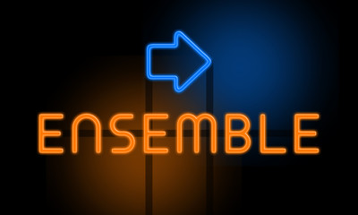 Ensemble - orange glowing text with an arrow on dark background