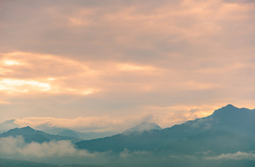 Naklejka na ściany i meble Landscape of Mountain with sunrise background.,Nature background.