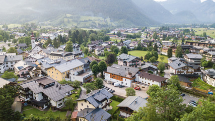 Fototapeta premium Aerial view of a village in the alpine mountains, Lofer, Austria
