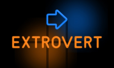 Extrovert - orange glowing text with an arrow on dark background