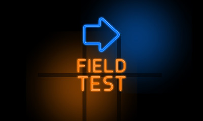 Field Test - orange glowing text with an arrow on dark background