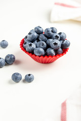blueberry in red cup 