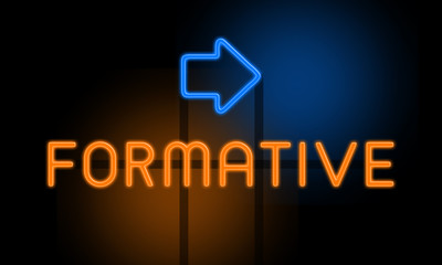 Formative - orange glowing text with an arrow on dark background