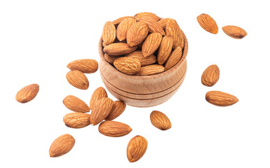 Almond nut in a wooden bowl isolated on a white background