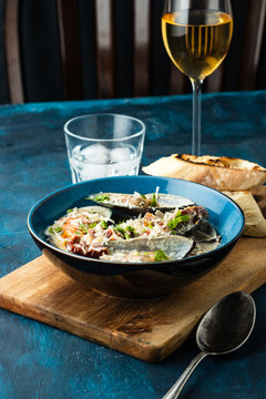 Mussels with Blue Cheese Sauce and Garlic Baguette.