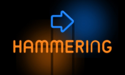 Hammering - orange glowing text with an arrow on dark background