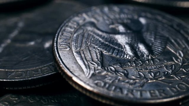 Close up detail on a United States quarter dollar coins.  finance and business concept