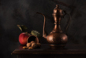stilllife with a copper jug (Kumgan) with apples and nuts