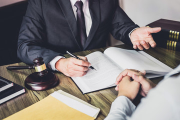 Businessman and Male lawyer or judge consult having team meeting with client, Law and Legal...
