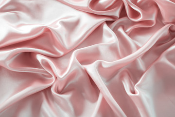pink silk texture,bakground, luxurious satin for abstract,design and wallpaper,soft and blur style,smooth,template.fabric drapery and Solid for backs and pillows.upholstery fabric from the courtyard.