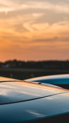 Smartphone HD wallpaper of beautiful sunset near Tabertshausen with car antenna in the foreground