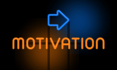 Motivation - orange glowing text with an arrow on dark background
