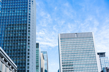 Fototapeta na wymiar Business image - Office building against the blue sky 