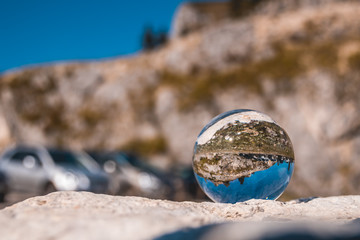 Crystal ball alpine landscape shot at the Loser summit-Altaussee-Steiermark-Austria
