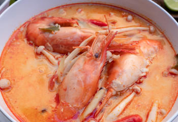 Tom yam kung or Tom yum in a white cup