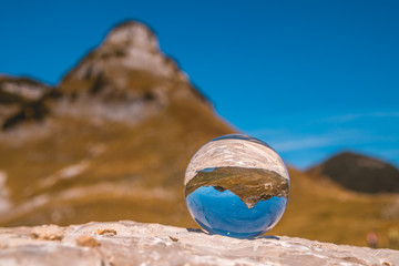 Crystal ball alpine landscape shot at the Loser summit-Altaussee-Steiermark-Austria