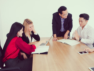 business people in meeting room,Business team explaining new business ideas