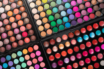 Cosmetic make-up background made of make-up palettes