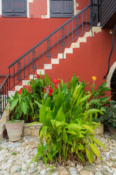 Hania, Crete - 09 26 2018: Stairs and garden at the hotel oasis