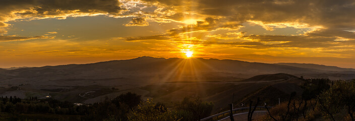 Panoramic view at the sunset above the Tuscany countryside from Volterra in Italy