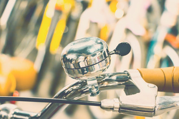 Bicycle handle bar and bicycle bell. Selective focus. Copy space.