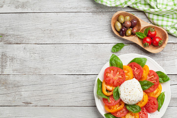 Caprese salad with tomatoes, basil and mozzarella