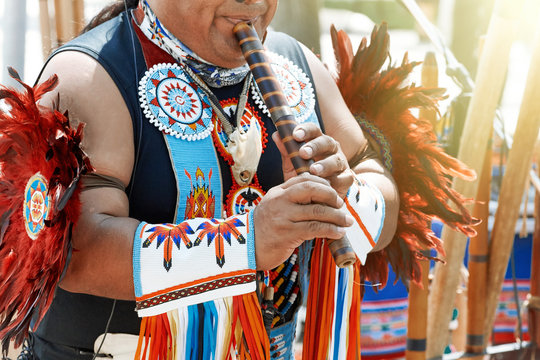 Man plying flute