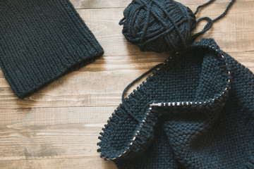 Fototapeta na wymiar Close-up knitting scarf. Process of knitting. Top view. Close up.