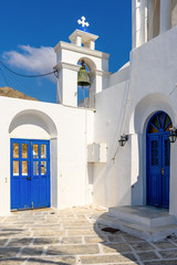 Serifos island with lovely whitewashed church and blue doors. Cyclades, Greece © vivoo