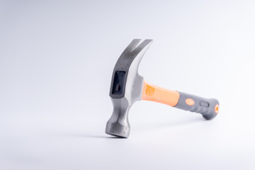 Hammer closeup on white background with selective focus and crop fragment