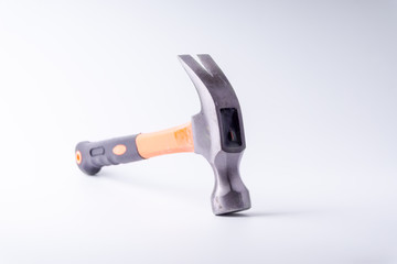 Hammer closeup on white background with selective focus and crop fragment