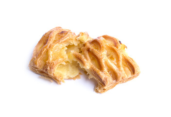 close up of crispy pineapple pie isolated on white background
