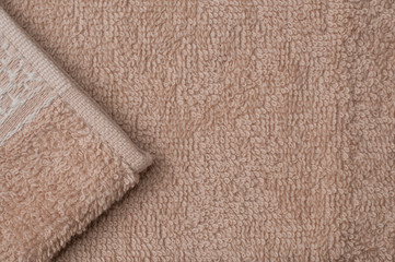 Fototapeta na wymiar Brown towel texture background, macro shot